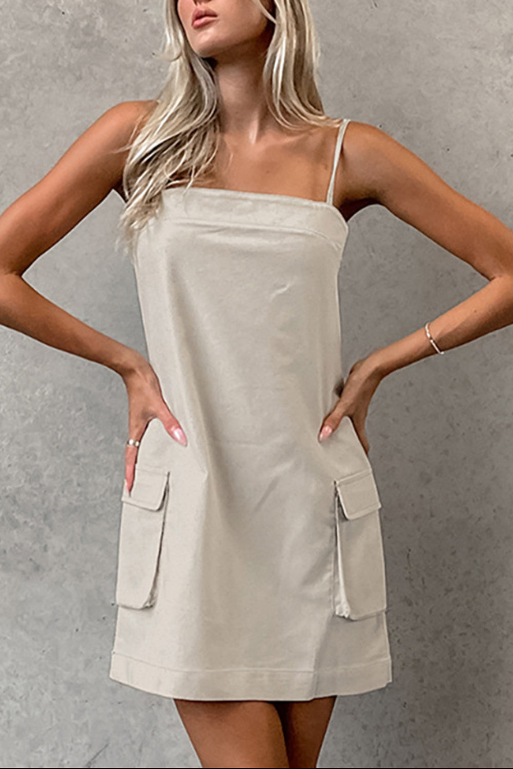 Parchment Minimalist Pocketed Sleeveless Backless Short Dress