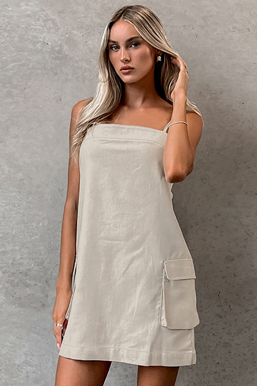 Parchment Minimalist Pocketed Sleeveless Backless Short Dress